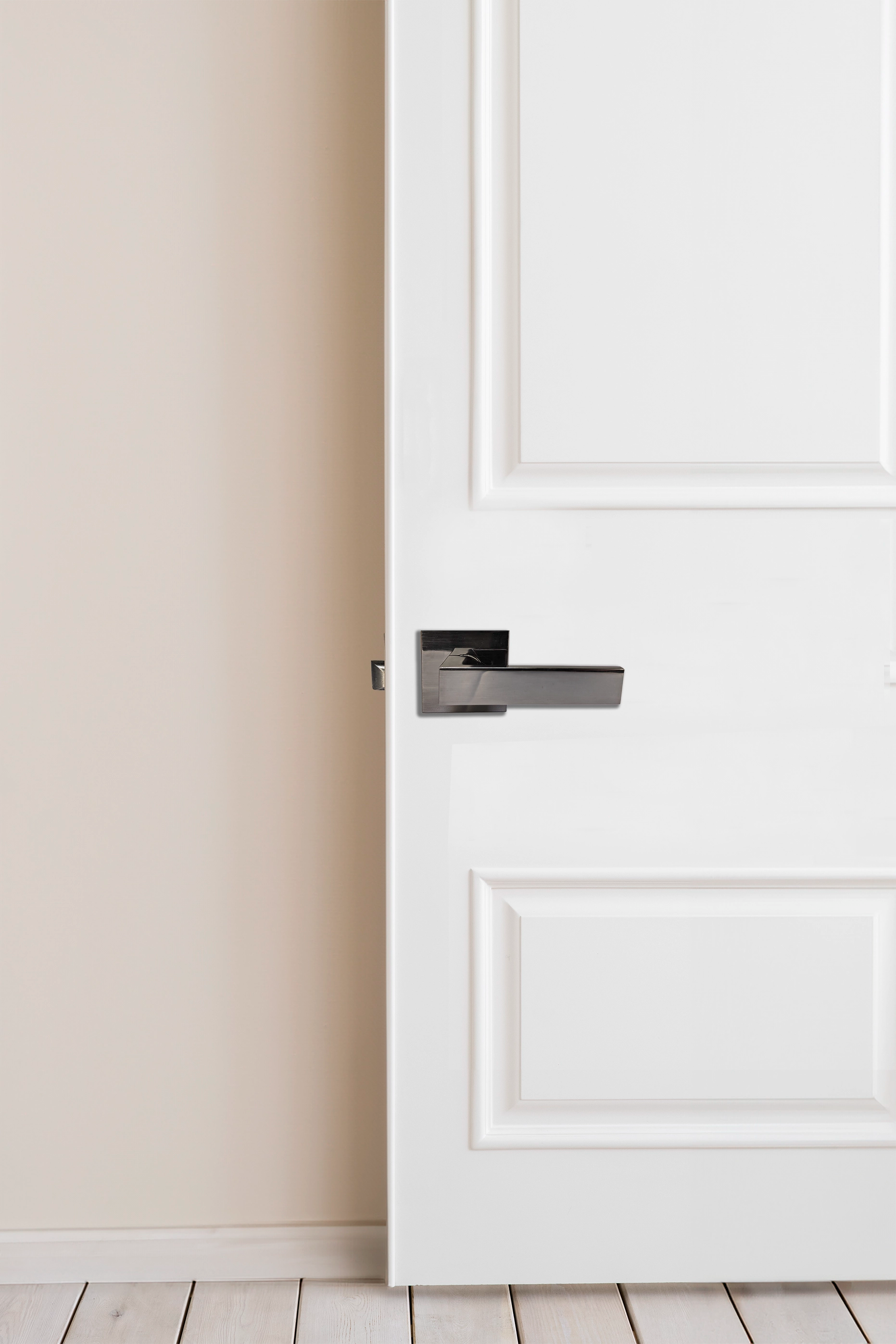 Modern LEver Door Handle with Square Rosette in Gun Metal Grey installed on door